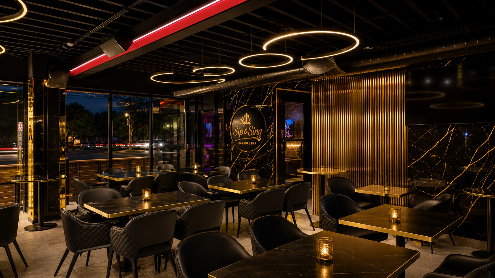 Sip & Sing interior - black marble, gold ring lighting and lounge seating